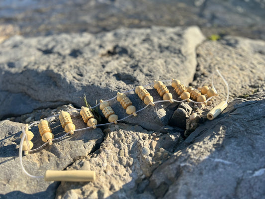 Wooden massage strap