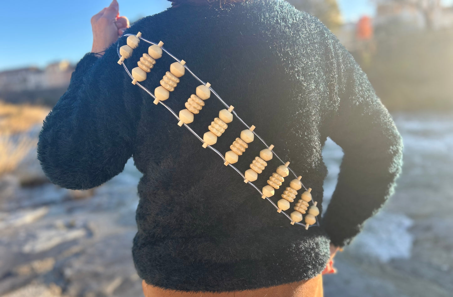 Wooden massage strap